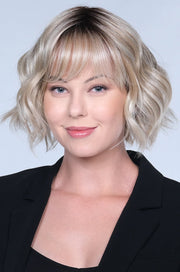 BOMBSHELL BLONDE • 60/88/1001R12 ••• Golden brown root wi pure blonde and satin blonde and a blend of white