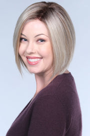 BOMBSHELL BLONDE • 60/88/1001R12 ••• Golden brown root wi pure blonde and satin blonde and a blend of white