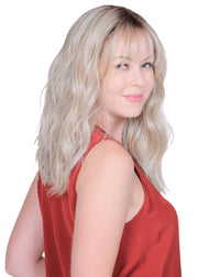 BOMBSHELL BLONDE • 60/88/1001R12 ••• Golden brown root wi pure blonde and satin blonde and a blend of white