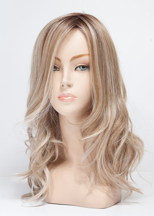 BOMBSHELL BLONDE • 60/88/1001R12 ••• Golden brown root wi pure blonde and satin blonde and a blend of white